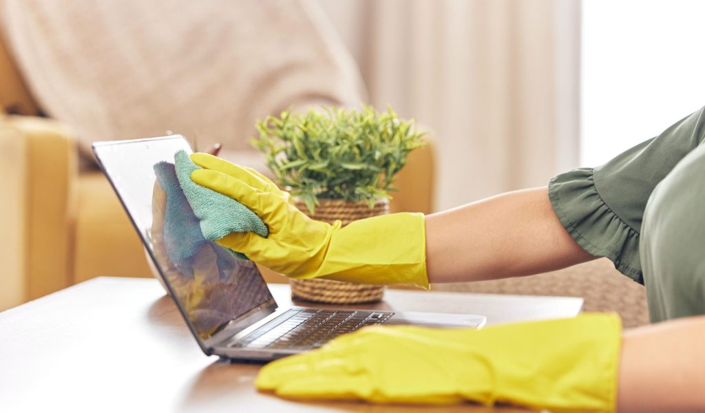 cleaning-laptop-hands-woman-home-with-rubber-gloves-hygiene-disinfection-washing-cleaner-service-housekeeping-closeup-female-maid-wipe-dust-dirt-stain-computer